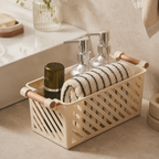 Bathroom storage basket styled on an open shelf